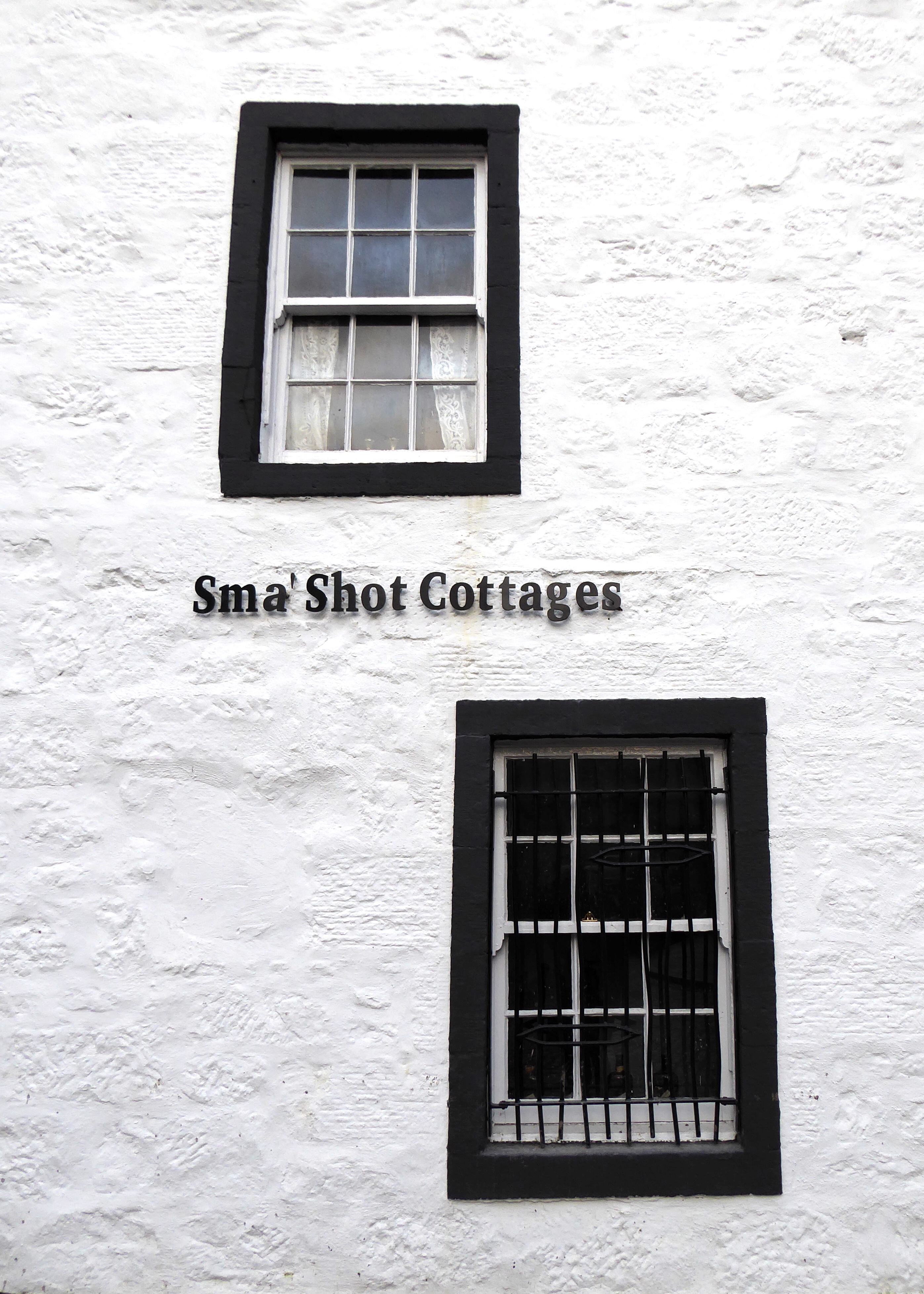 Traditional windows and whitewashed walls at Sma’ Shot Cottages